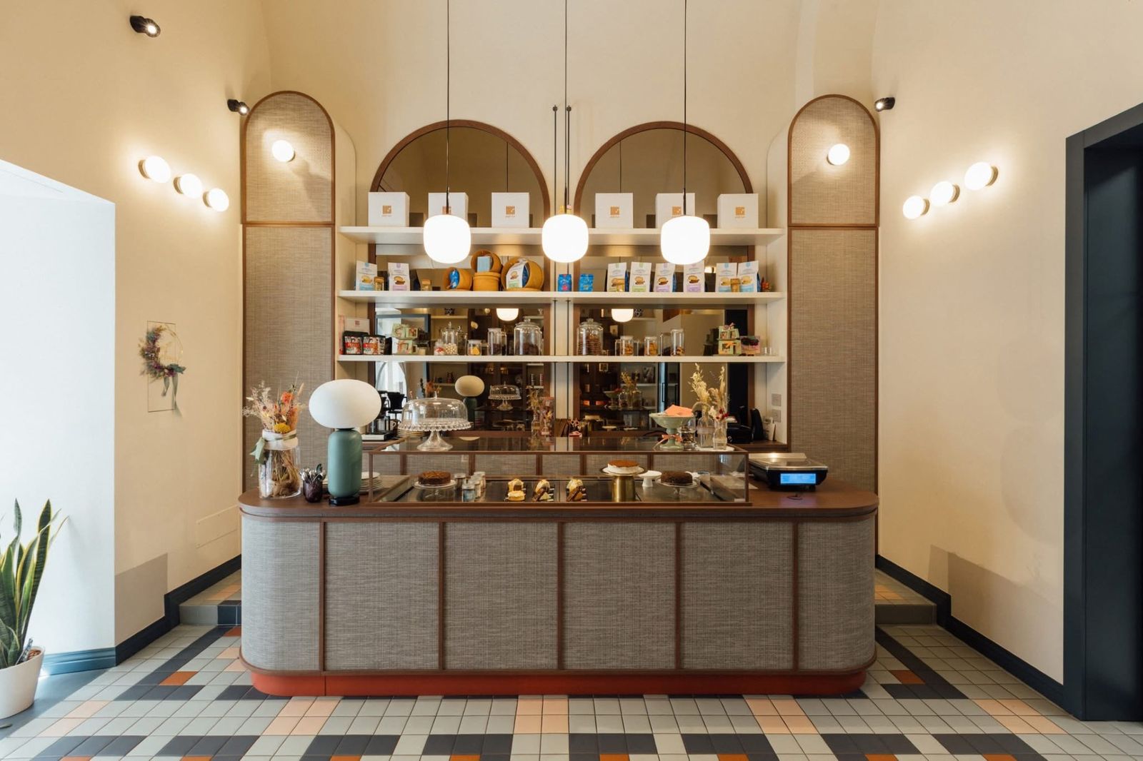 Arched counter and shelving at Rosy's Bakery